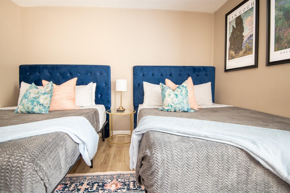 There is plenty of space in this bedroom for everyone to move around with ease. Every pillow has been fluffed for your delight and enjoyment.