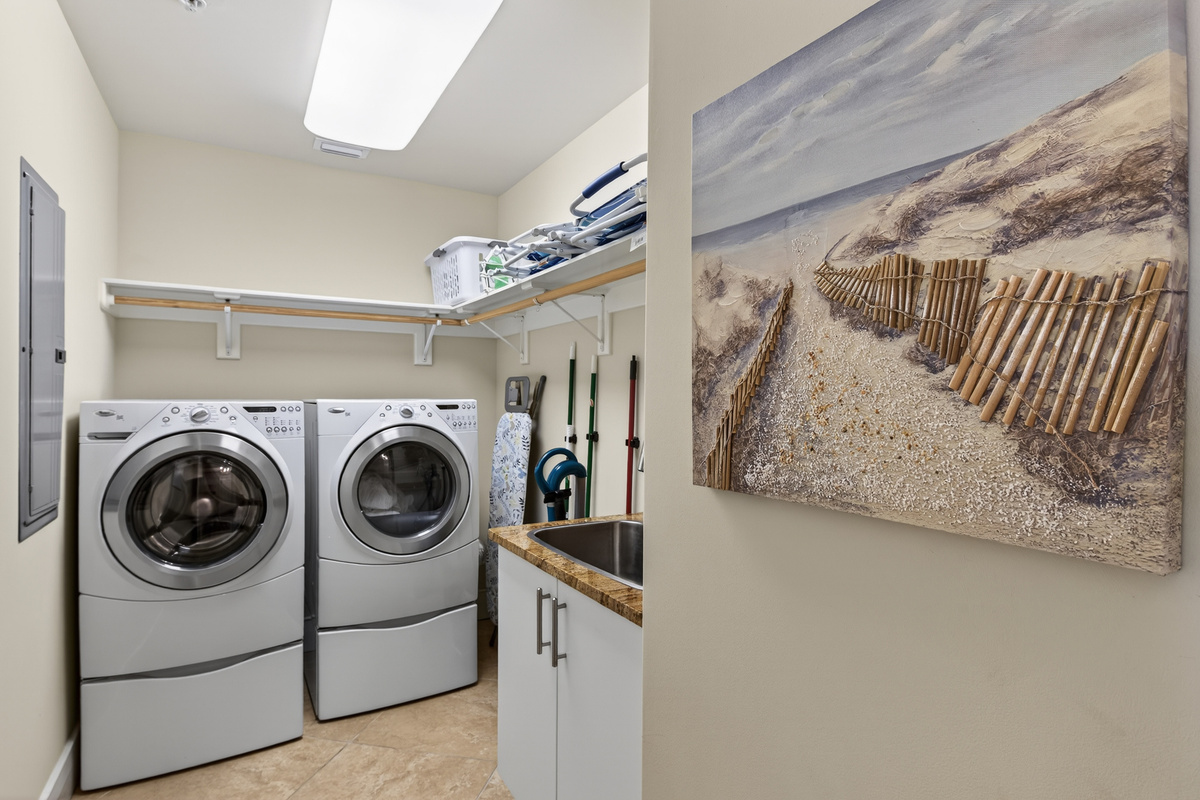 Laundry room, full size washer / dryer, sink