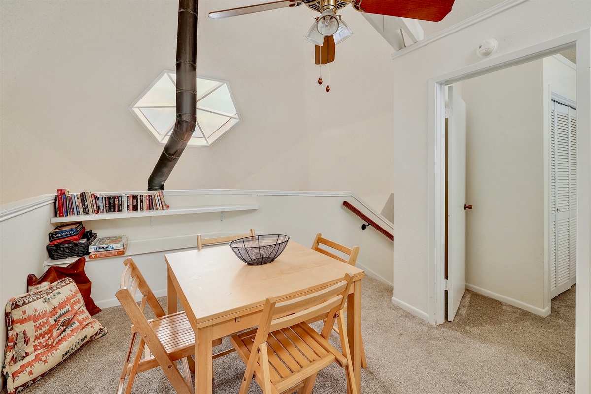 There is a table and games in the loft up the stairs