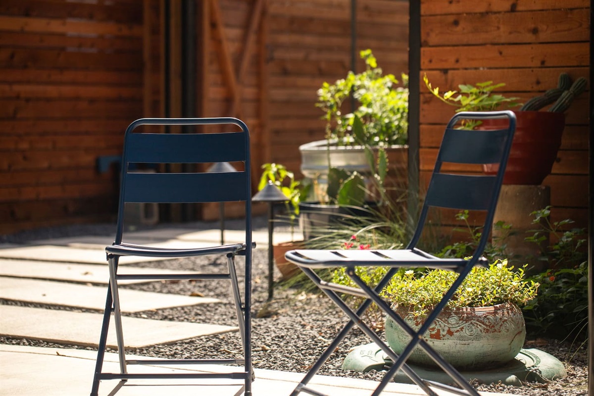 Charming outdoor nook perfect for morning coffee or quiet evening conversations.