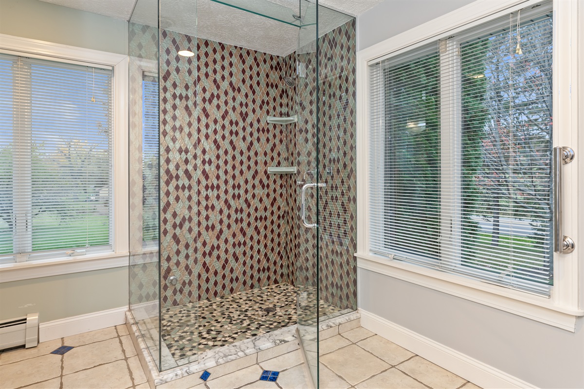 Full master bathroom with walk in shower