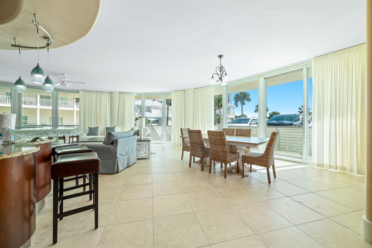 Imagine yourself in this high-end luxury condo, where the open layout flows effortlessly from the well-equipped kitchen to the spacious living and dining areas, all while being just a stroll away from Flora-Bama.