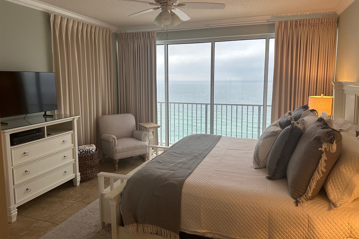 Master bedroom with king bed and beach view