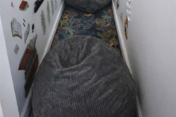 Imagination is our specialty at Magic City Manor. Welcome to our reading nook! Find it downstairs under the stairs!