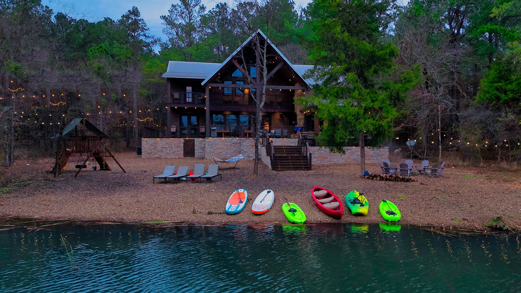 Expansive decks, peaceful pond views, and endless sunsets—your Hochatown getaway starts here