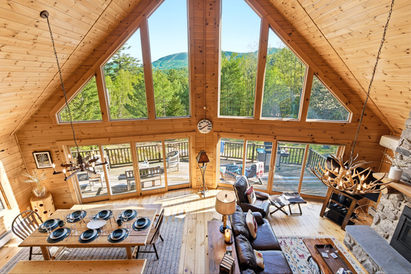 Take in sweeping mountain views from the comfort of the cabin’s bright and airy main living space.