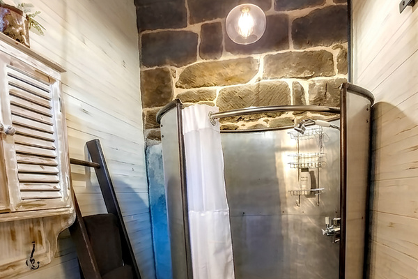 Main Level Bathroom offers an oval shower