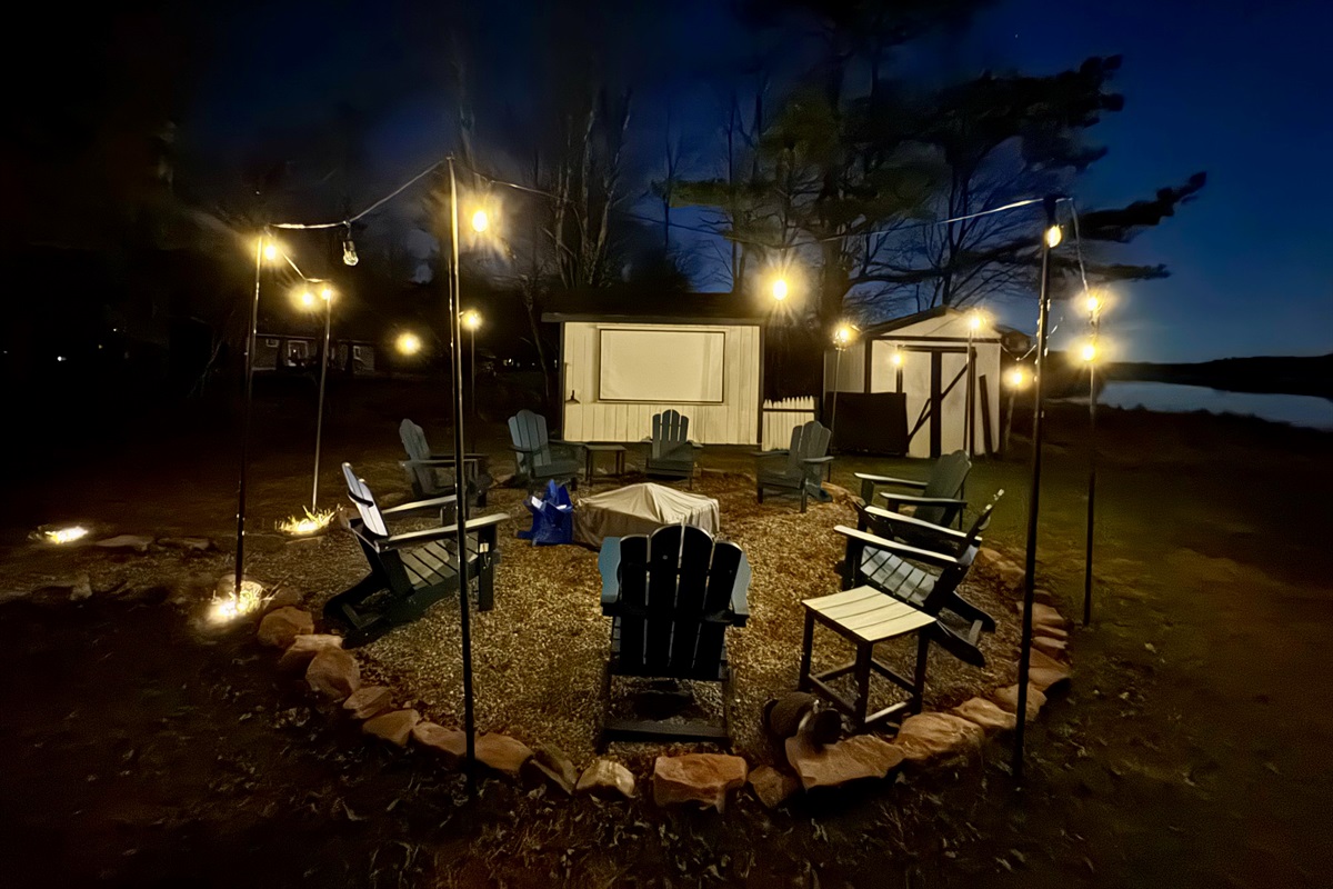 An outdoor cinema beneath the night — movie magic under the stars.