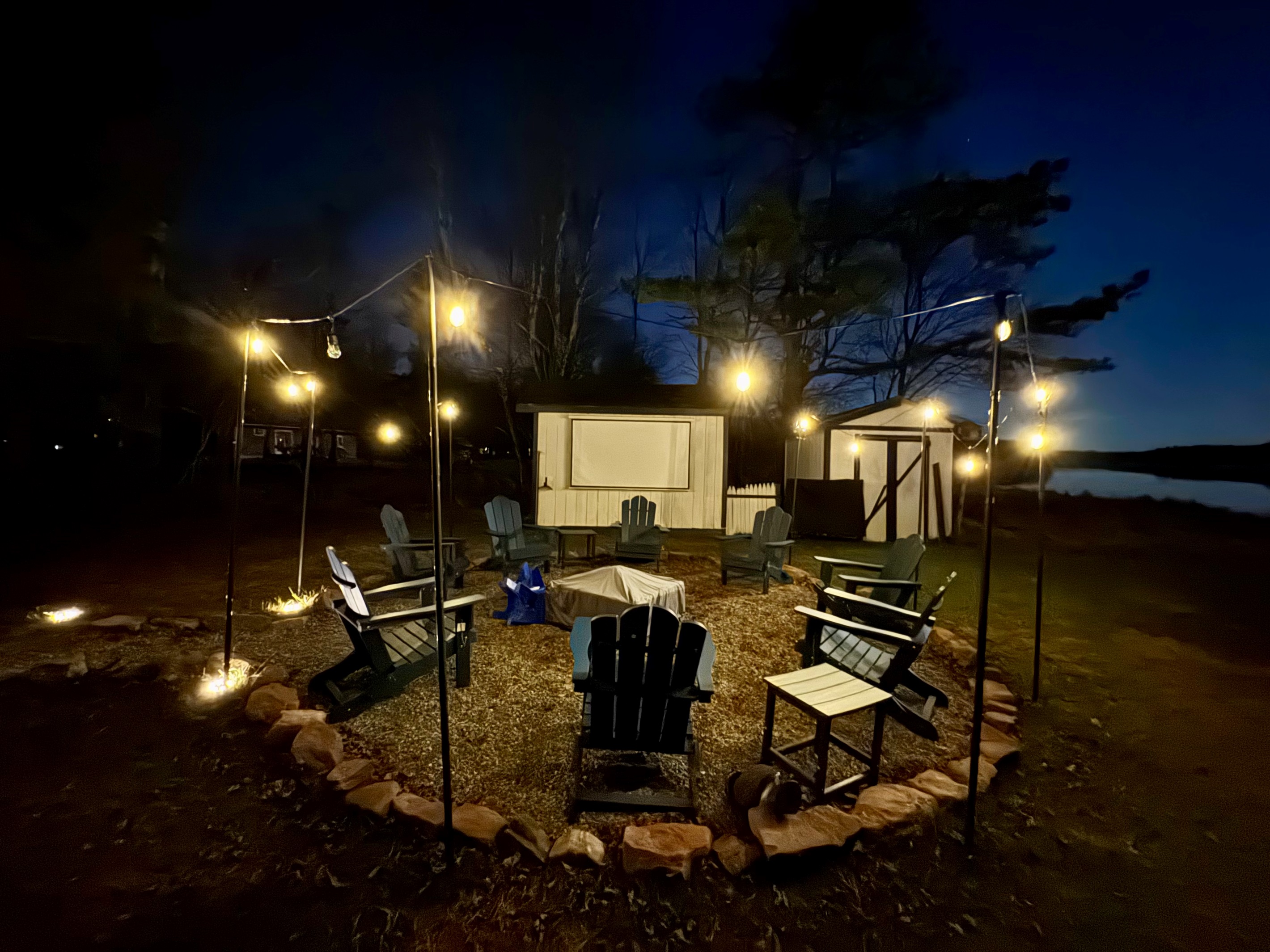 An outdoor cinema beneath the night — movie magic under the stars.