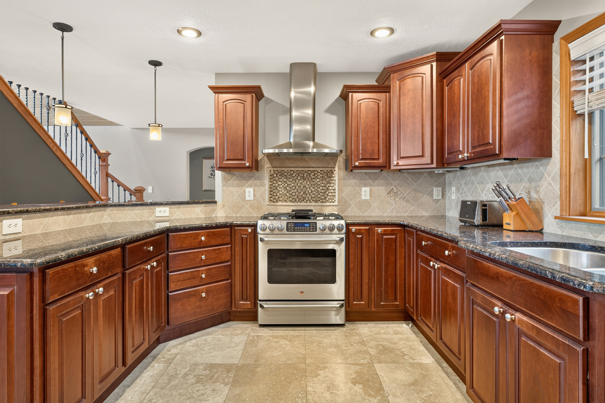 Kitchen with wooden cabinetry and stainless steel appliances
