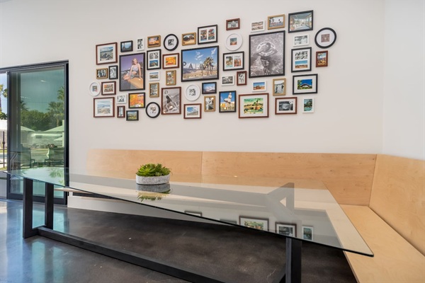 Custom Bulthaup-inspired floating breakfast booth with seating for 10