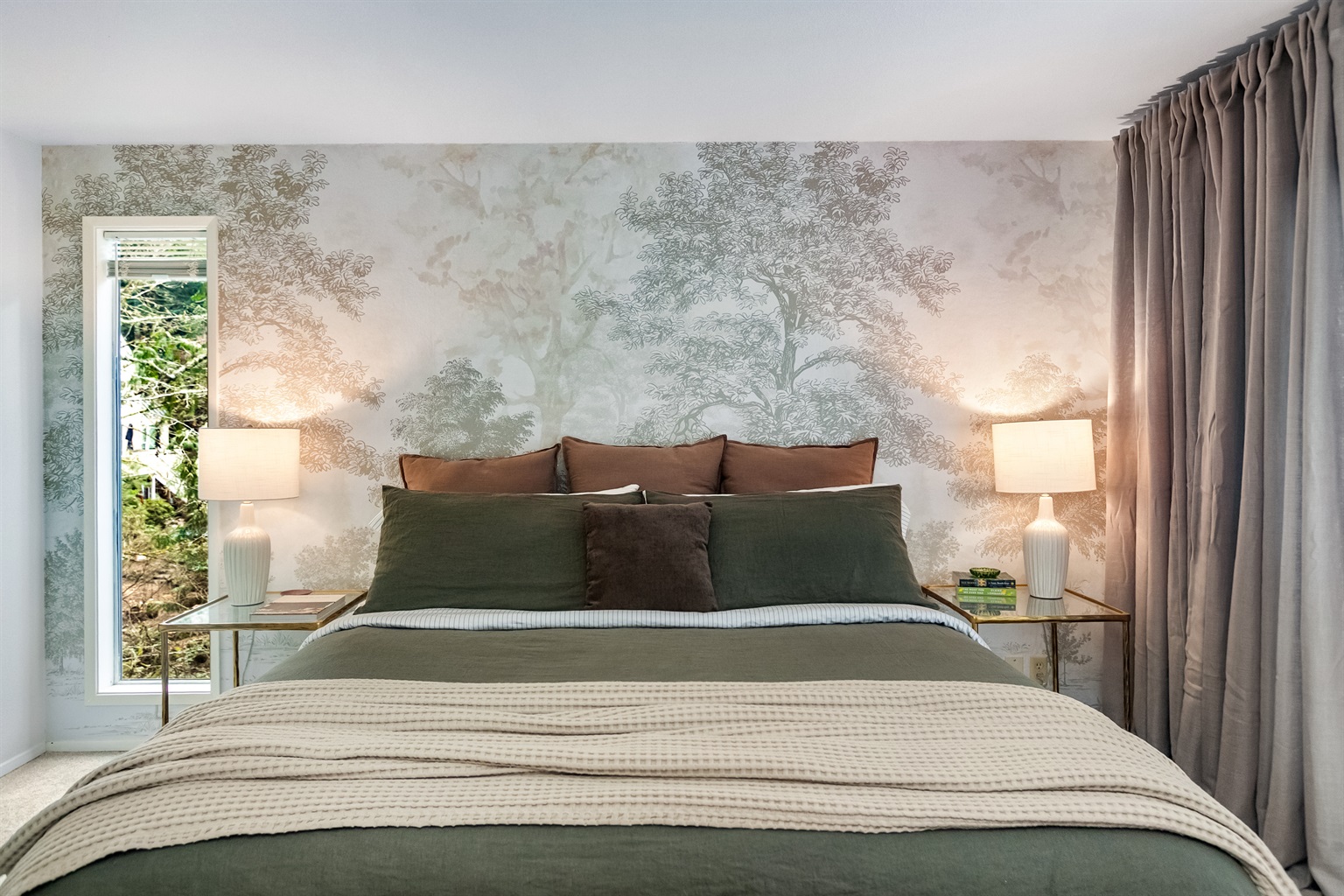 The primary suite with king bed is full of designer touches that will make you feel at home.