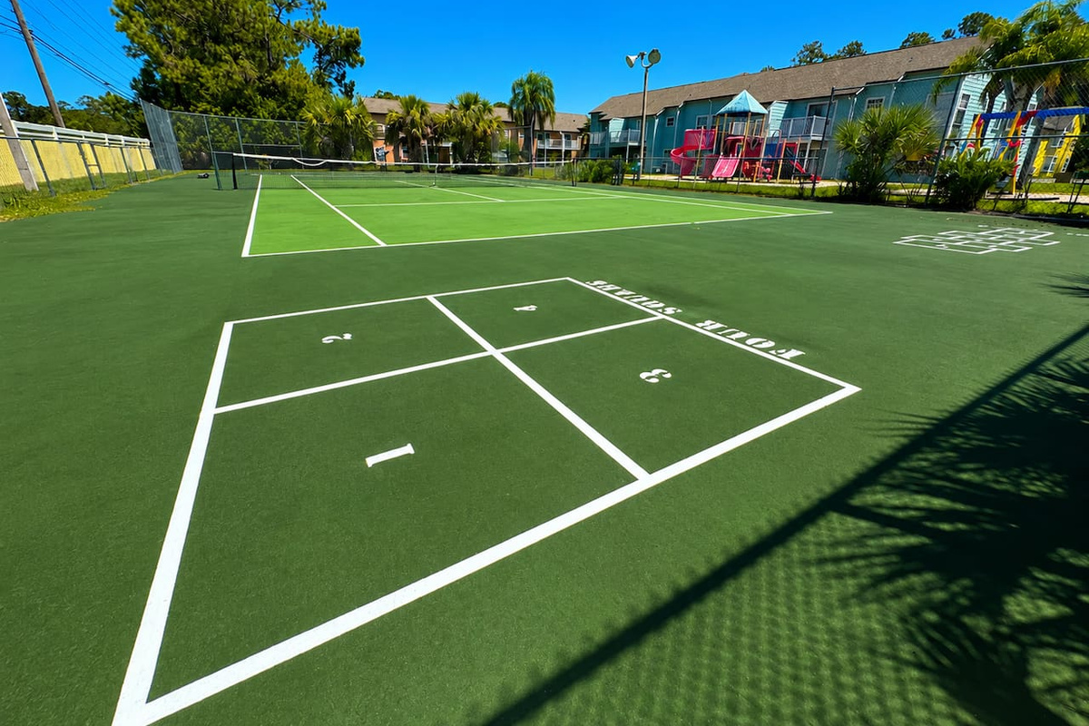 Multi-use community sports court with space for tennis and pickleball.