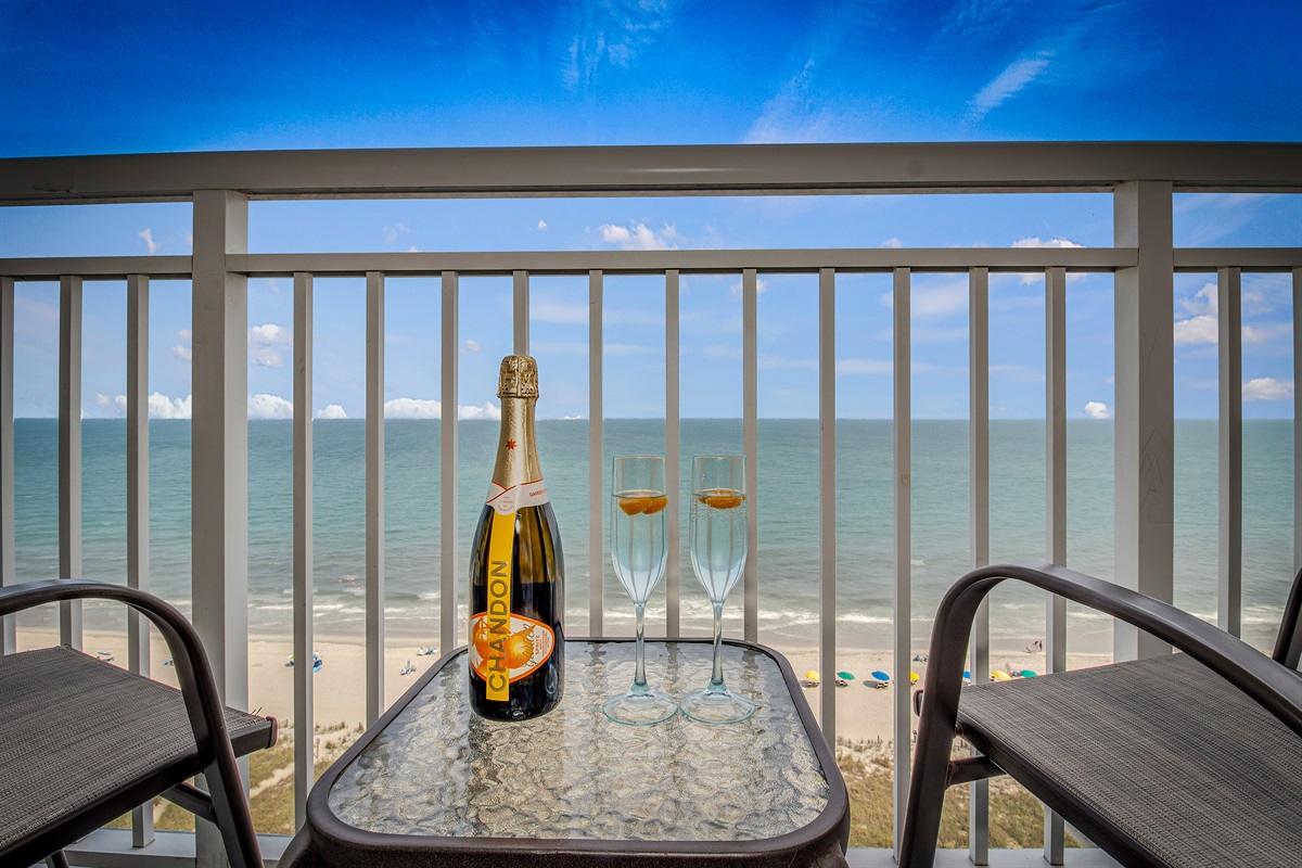Sip your morning coffee with panoramic views in this balcony!