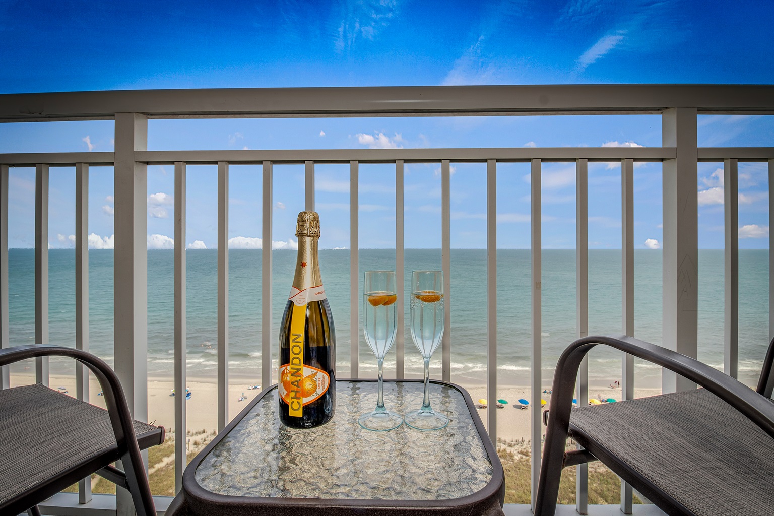 Sip your morning coffee with panoramic views in this balcony!