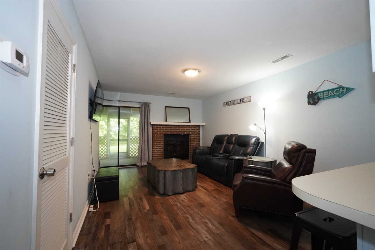Living space with private screened-in porch access