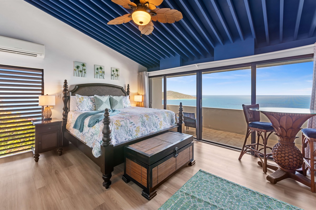 Primary suite with king bed, luxury linens, and sweeping ocean views; wake up in paradise.