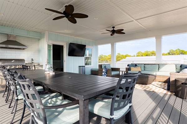 3rd Floor Patio with grill, large dining table, smart TV, large sectional, and firepit
