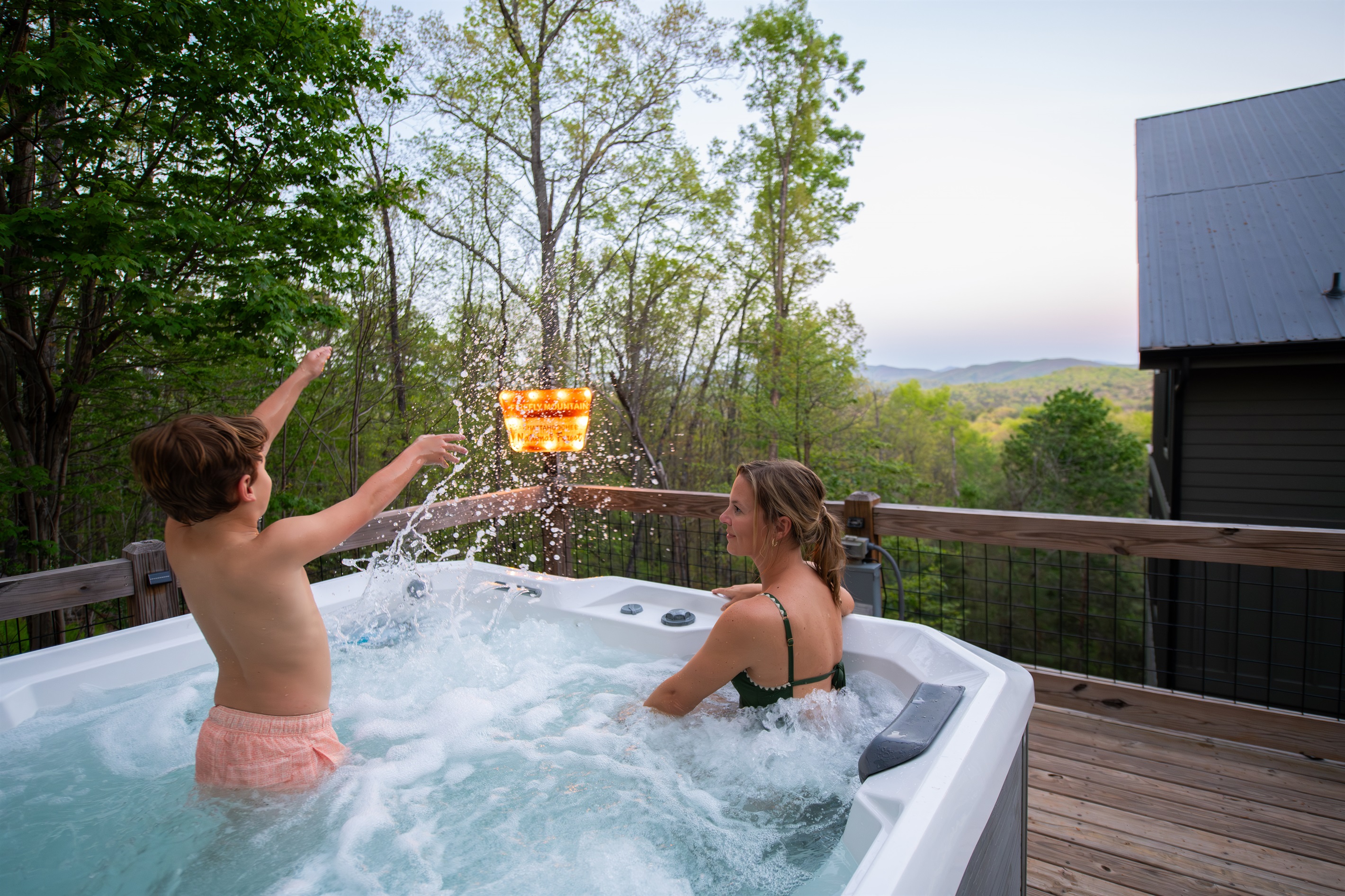 Hot Tub | Relax and unwind with panoramic mountain views