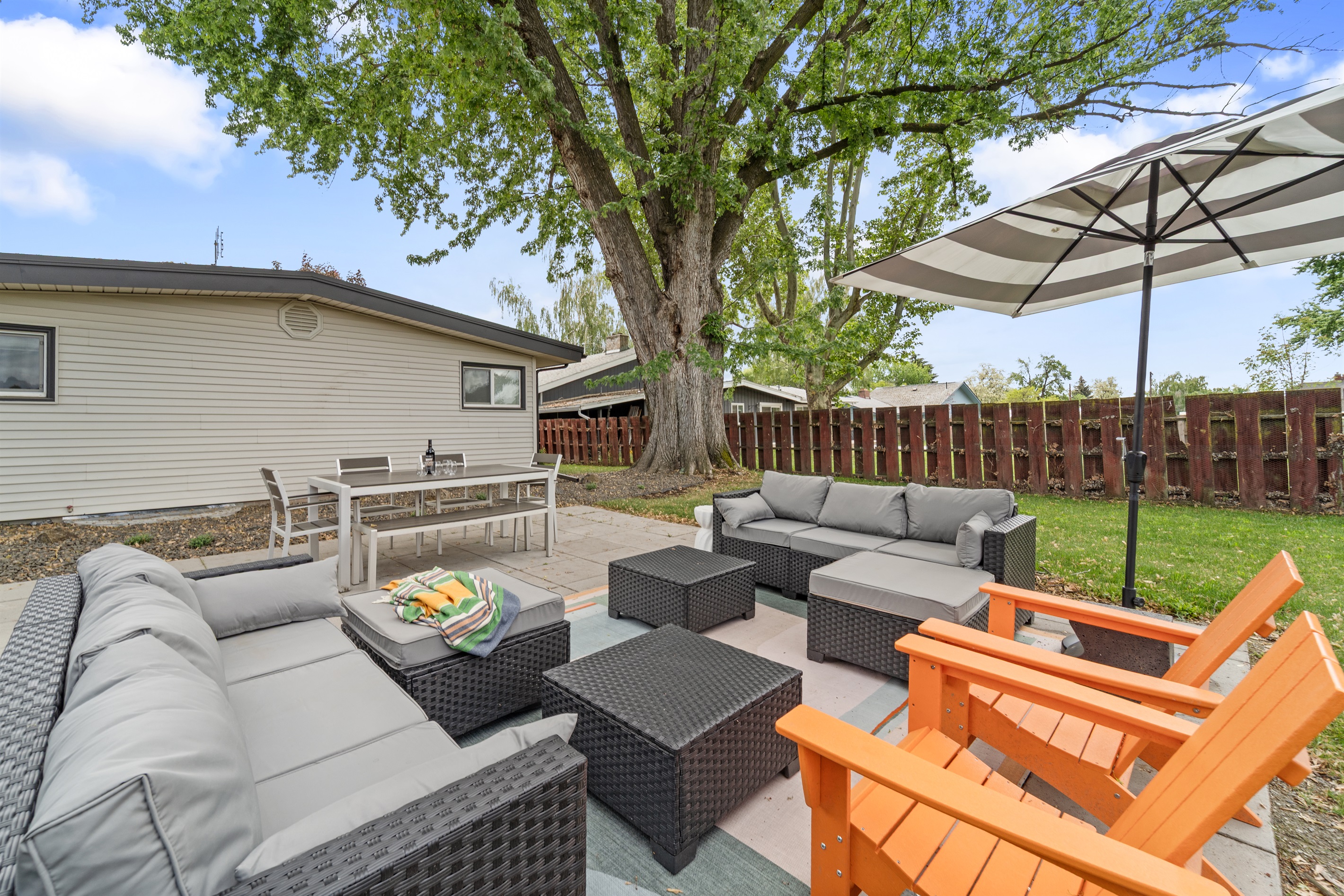 Outside patio: dining table, lounge area. 