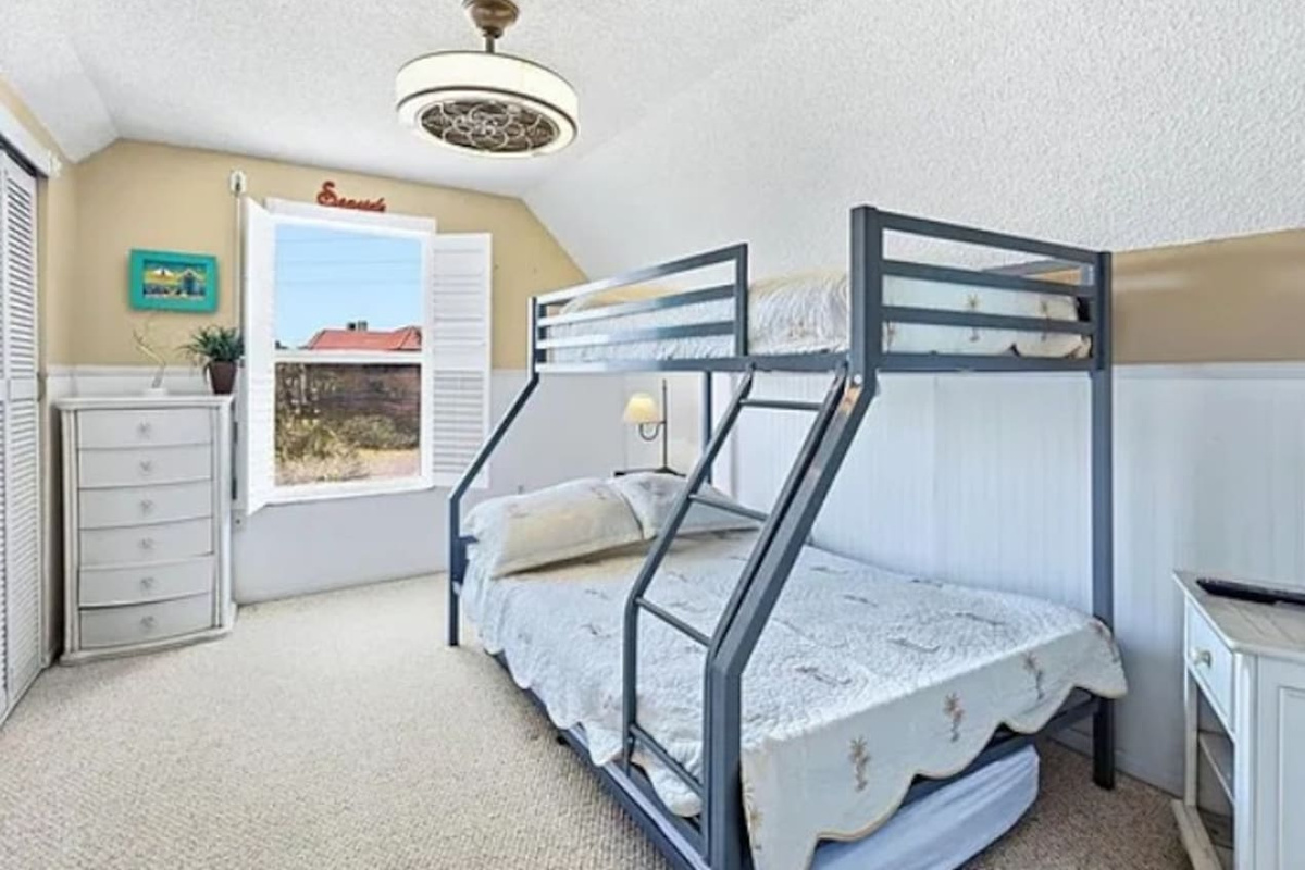 Bunkbed featuring a full and twin with an additional trundle bed underneath ensuring the kiddos have plenty of space for a restful night! 