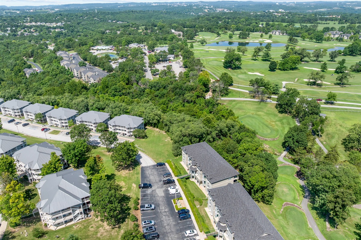 Wider resort aerial highlights how tucked-away and green this part of Holiday Hills feels.