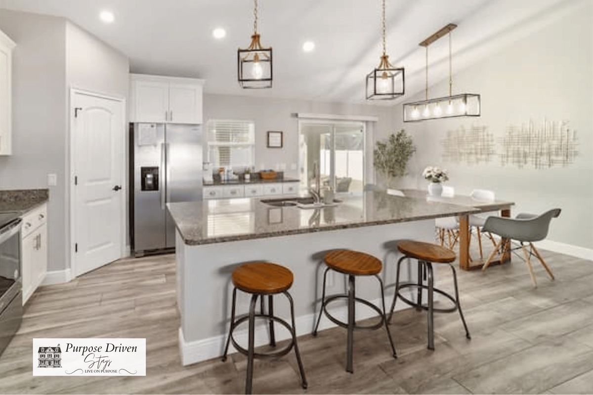 Whether you're preparing family meals or enjoying morning coffee, this beautifully designed kitchen offers comfort, convenience, and style at every turn.