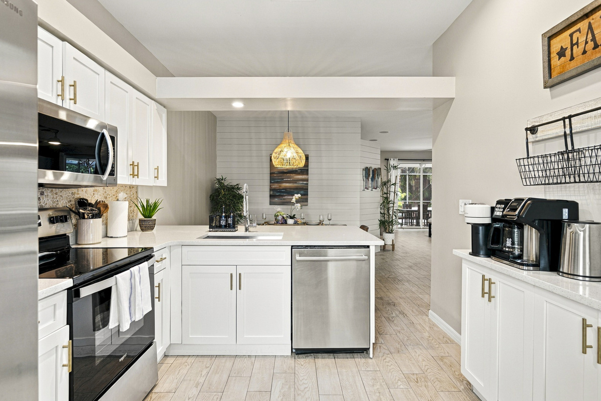 Bright and spacious kitchen with stainless steel appliances