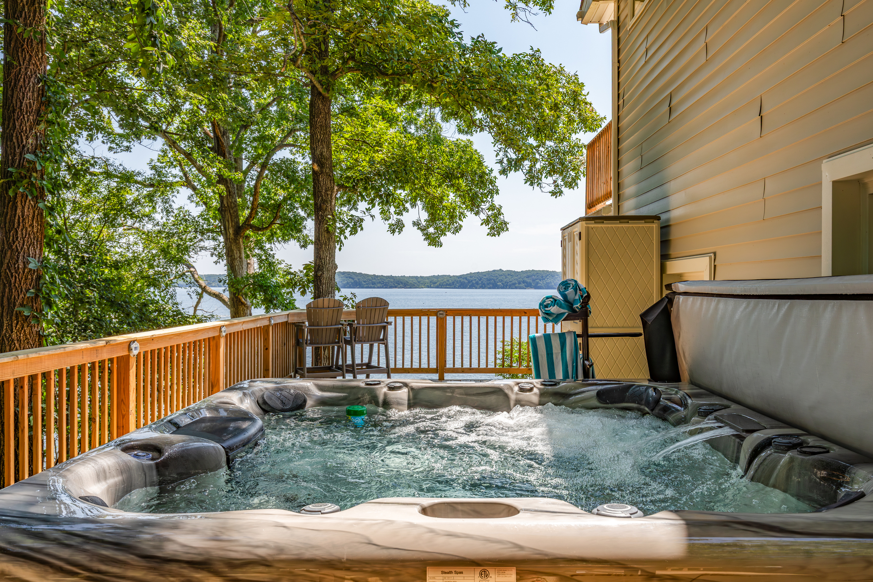 Soak in the private hot tub while enjoying the lakefront setting and surrounding mature trees.