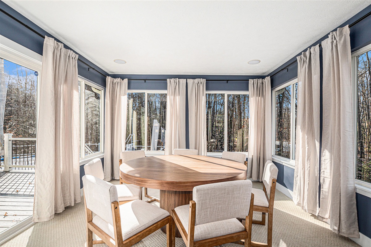 Need extra room at the table? This sunroom adds space and sunshine to every meal.