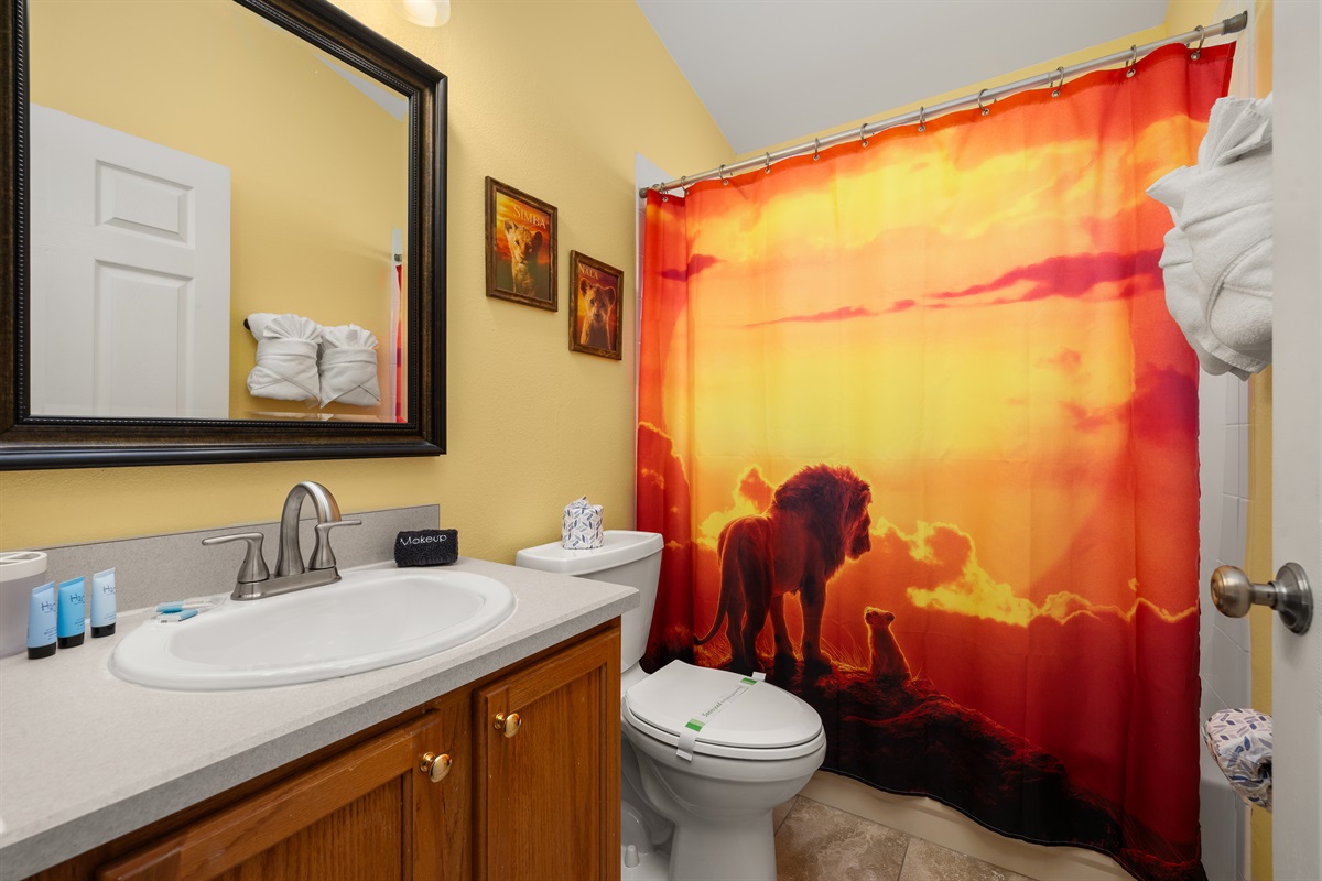 The shared bath is between the two twin bedrooms.