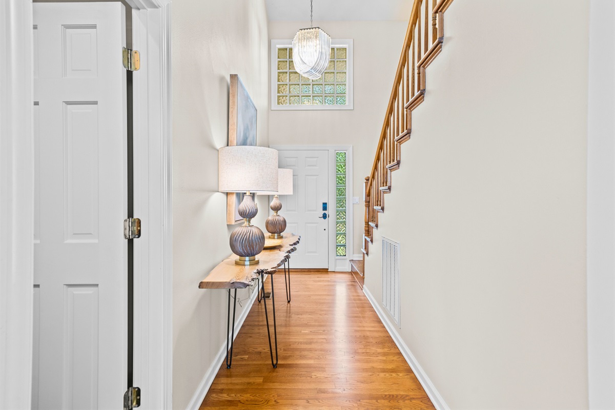 Step into a bright, welcoming entryway that instantly feels like home.