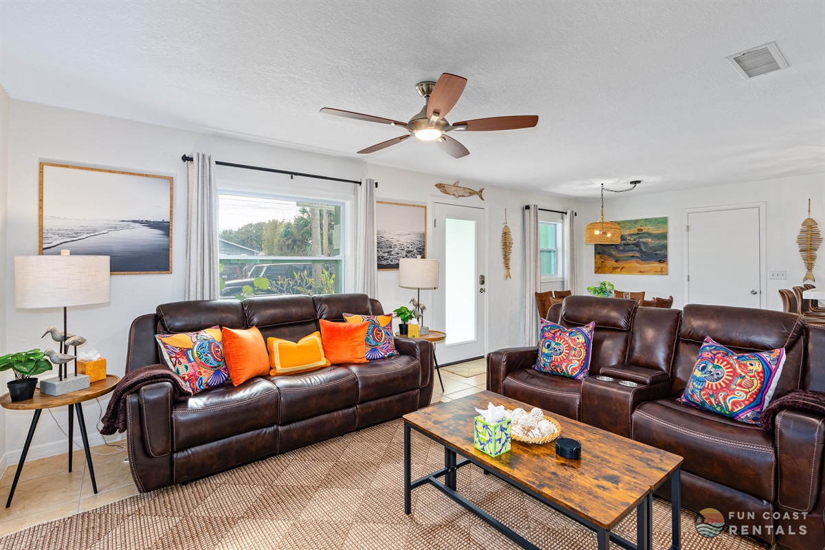 Spacious Living Room with lots of natural light ample seating!