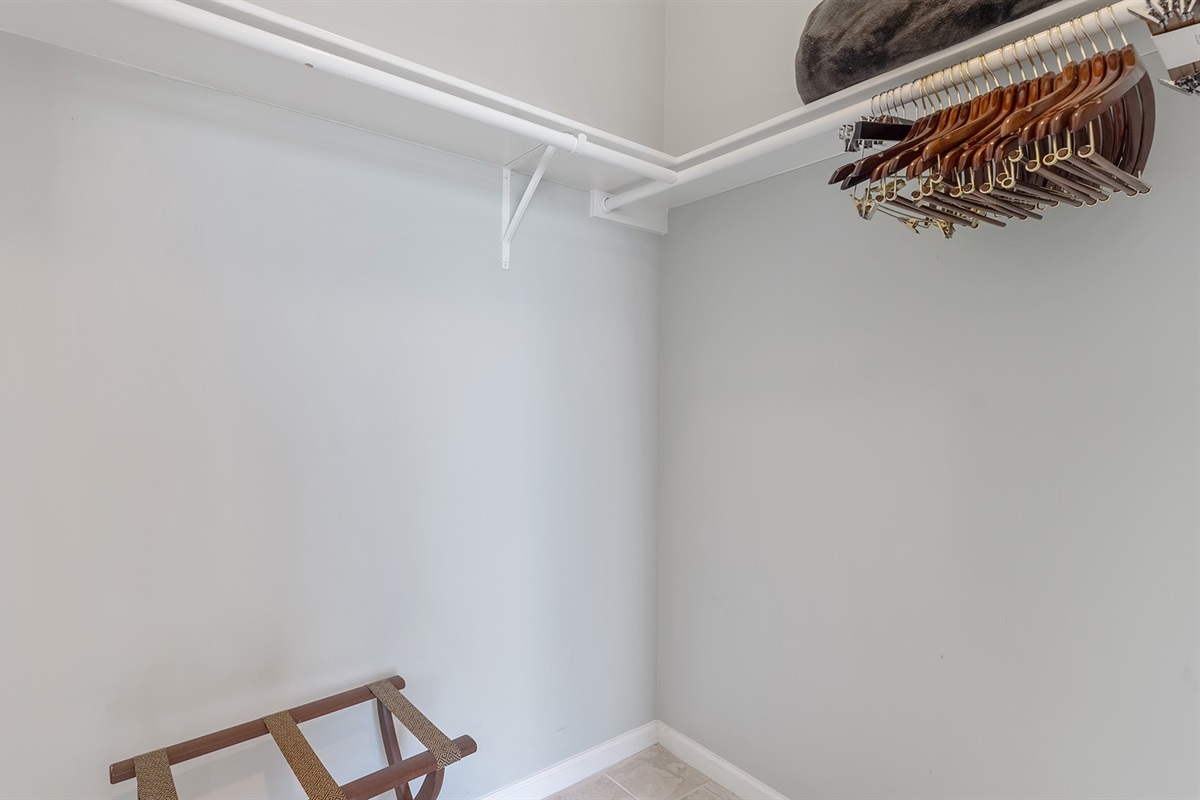 Master Bathroom #1: Full walk-in closet with hangar and storage space.