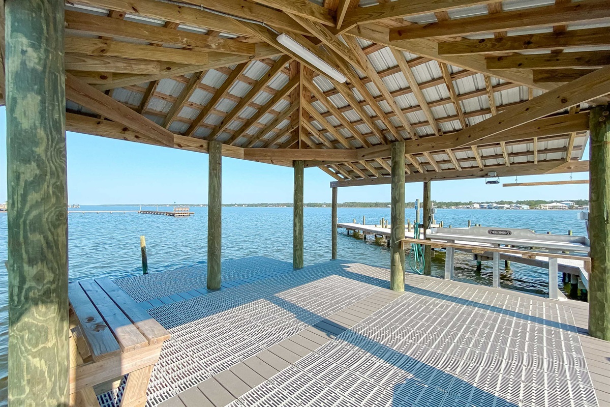 Waterfront living at its finest. Enjoy exclusive access to boat slips and a dedicated fishing dock during your Gulf Shores getaway.