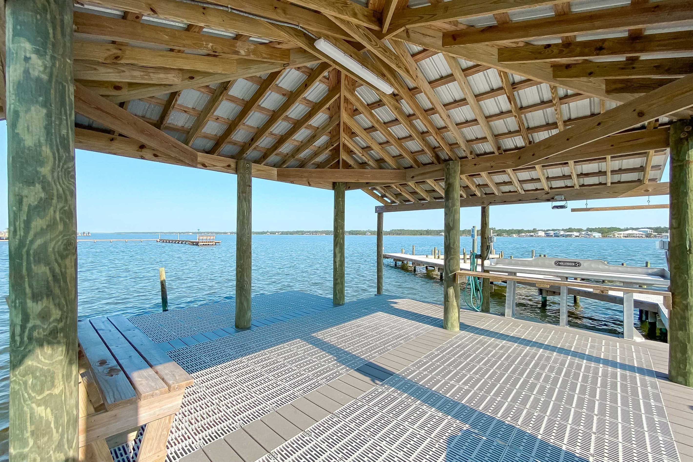 Waterfront living at its finest. Enjoy exclusive access to boat slips and a dedicated fishing dock during your Gulf Shores getaway.
