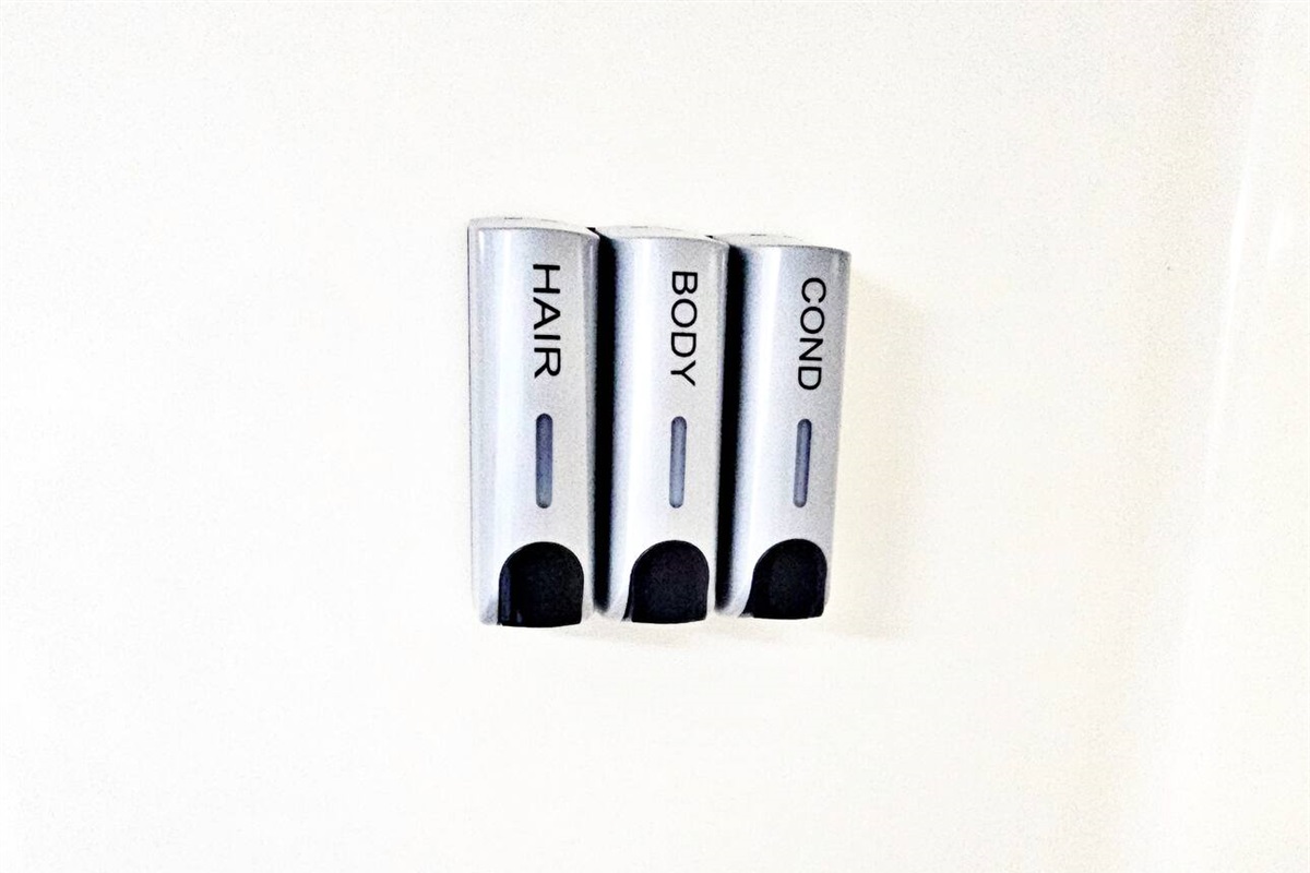 Shampoo, conditioner, and body wash dispensers are provided in each bathroom. 