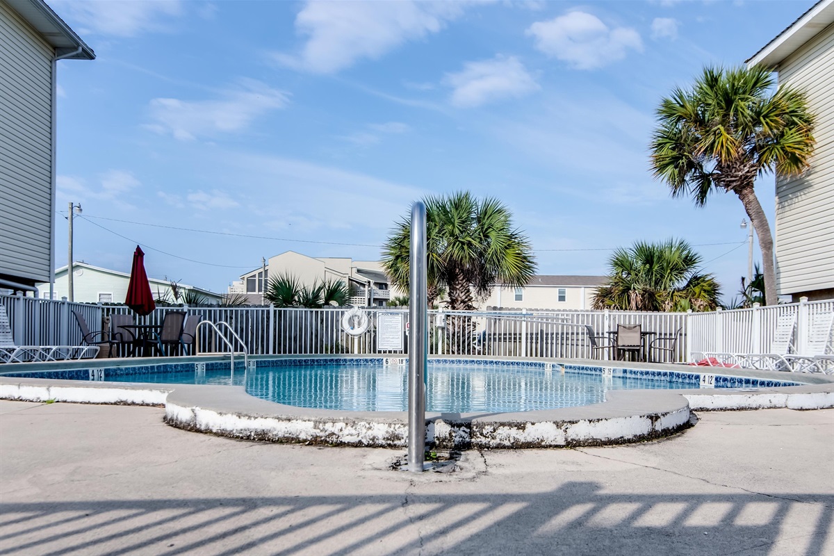Outdoor Pool - The outdoor pool is a great spot for cooling off and hanging out with your friends. Lounge chairs are provided, and also tables with chairs and umbrellas for enjoying a nice picnic by the pool