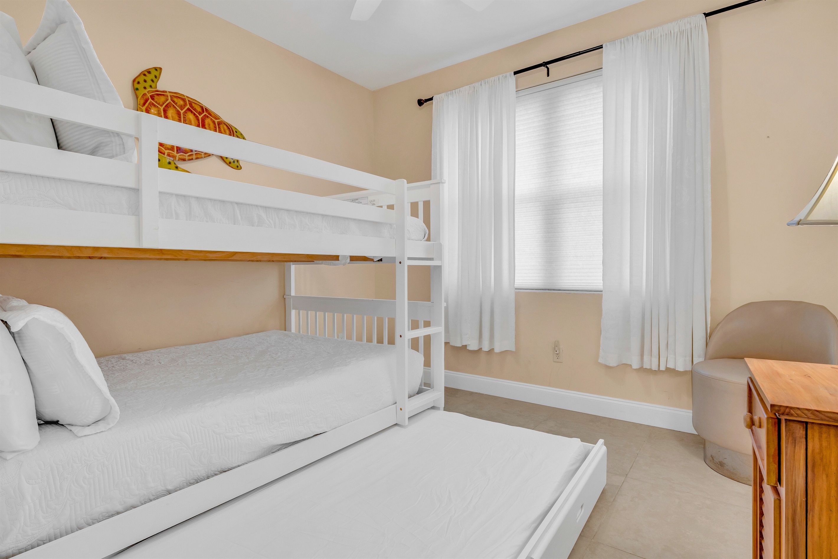 and a pull out twin size trundle bed