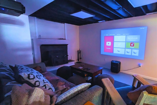 Enjoy a cinematic experience in our cozy theater room, the perfect space for movies and entertainment.