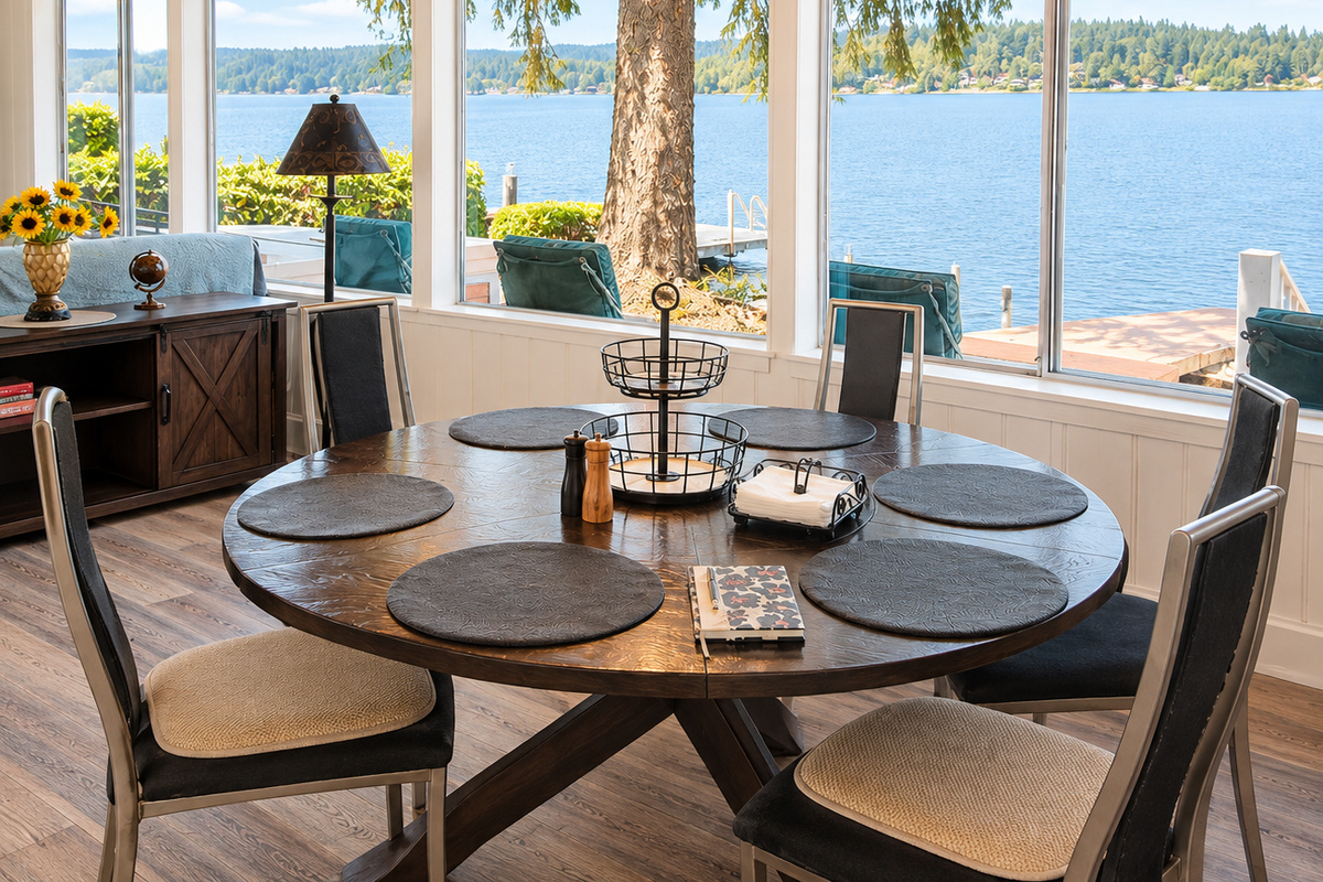 Dining room with comfortable seating for six, perfect for enjoying meals together or gathering for a relaxed evening.