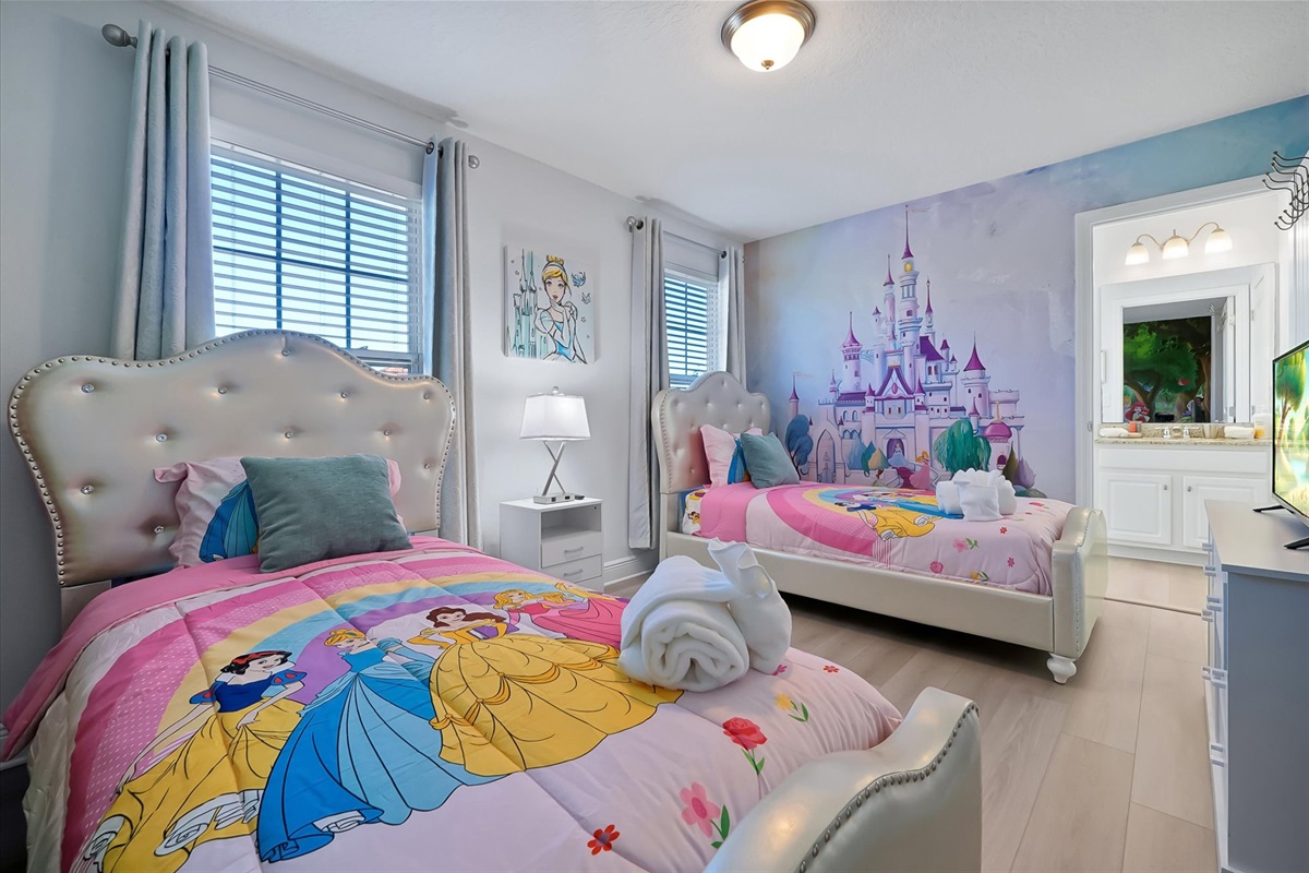 Twin beds await your princesses.