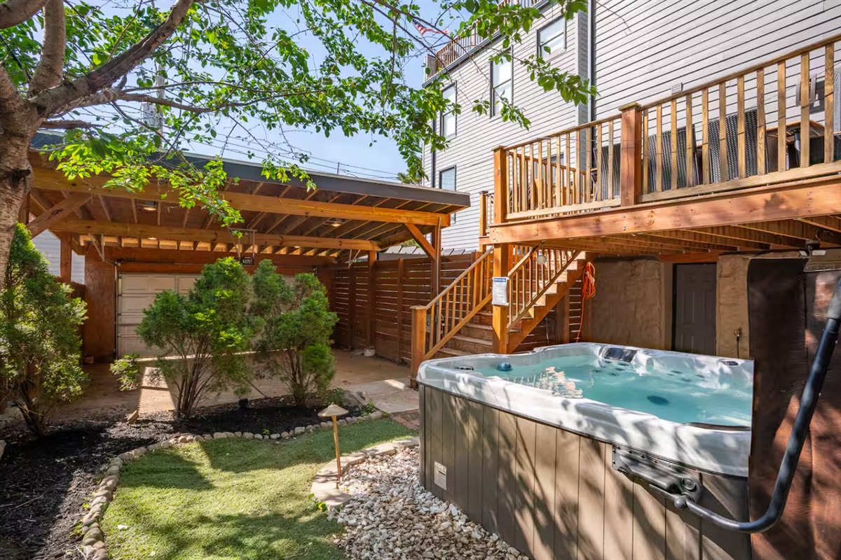 Your fenced-in, private backyard retreat features a hot tub, outdoor seating, and two elevated decks to enjoy throughout your stay.
