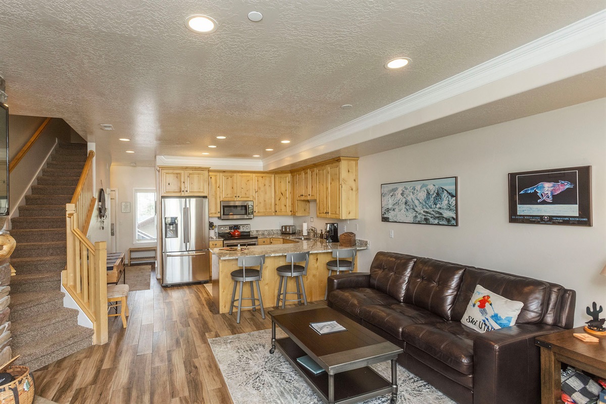 Stretch out in a comfortable living space with ample seating, warm finishes, and plenty of room for everyone to relax together after adventure-filled days.
