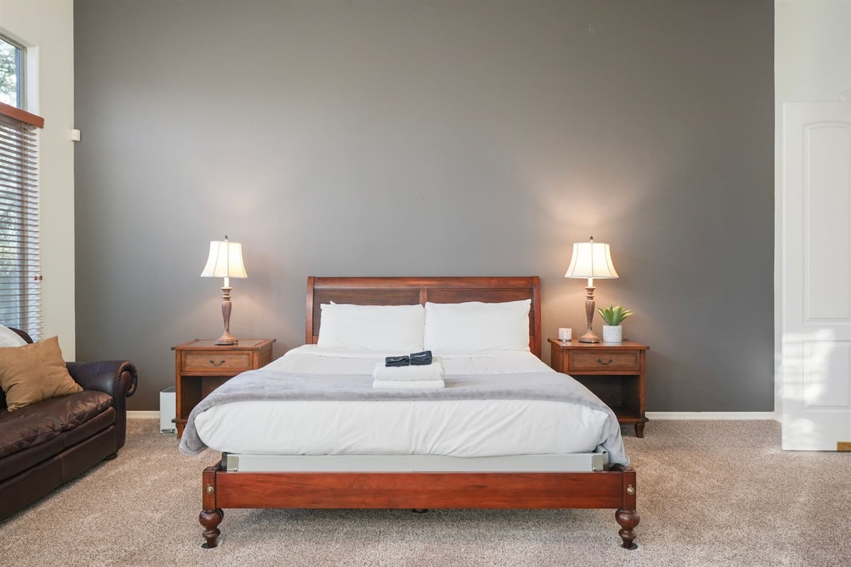 King-size bed with luxury linens and a calming, modern design