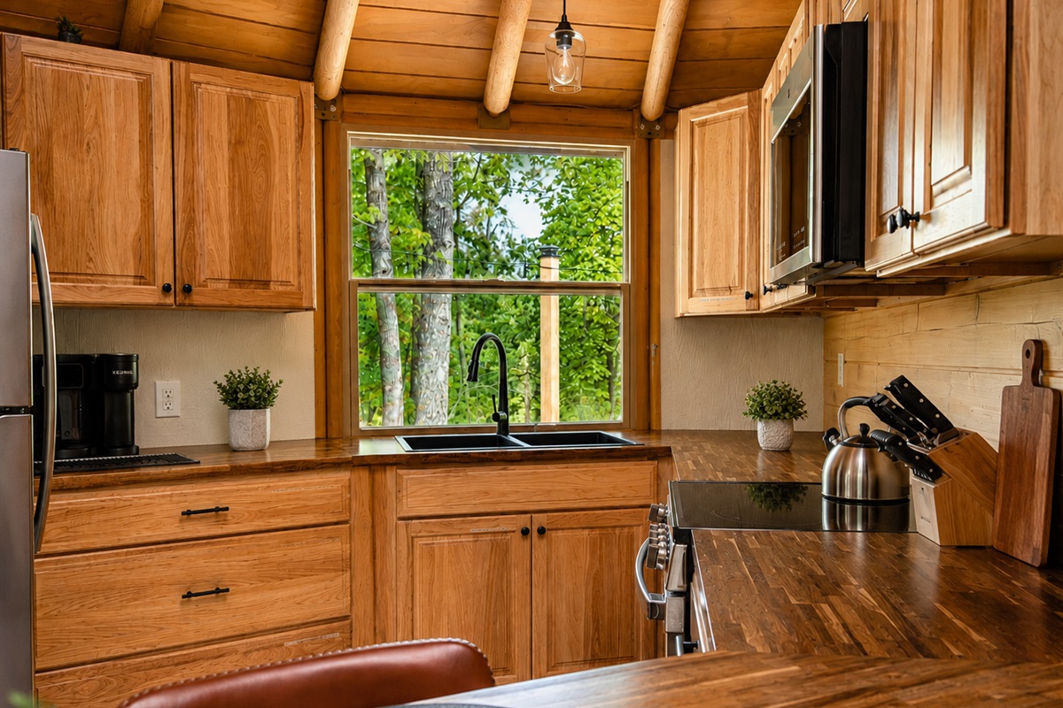 Fully equipped kitchen with everything needed for cooking and dining