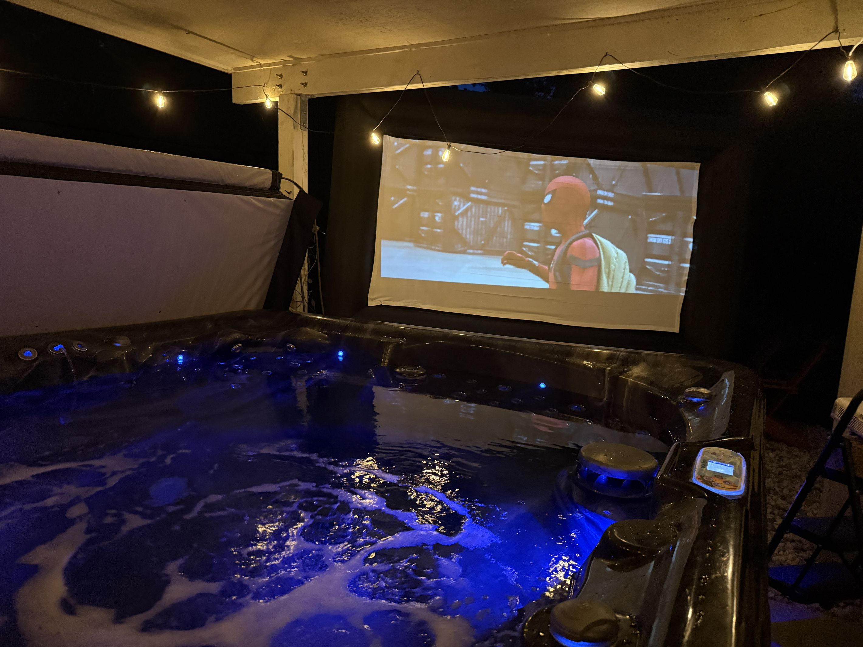 Watch a movie on our inflatable screen at night from the hot tub or next to the fire :)