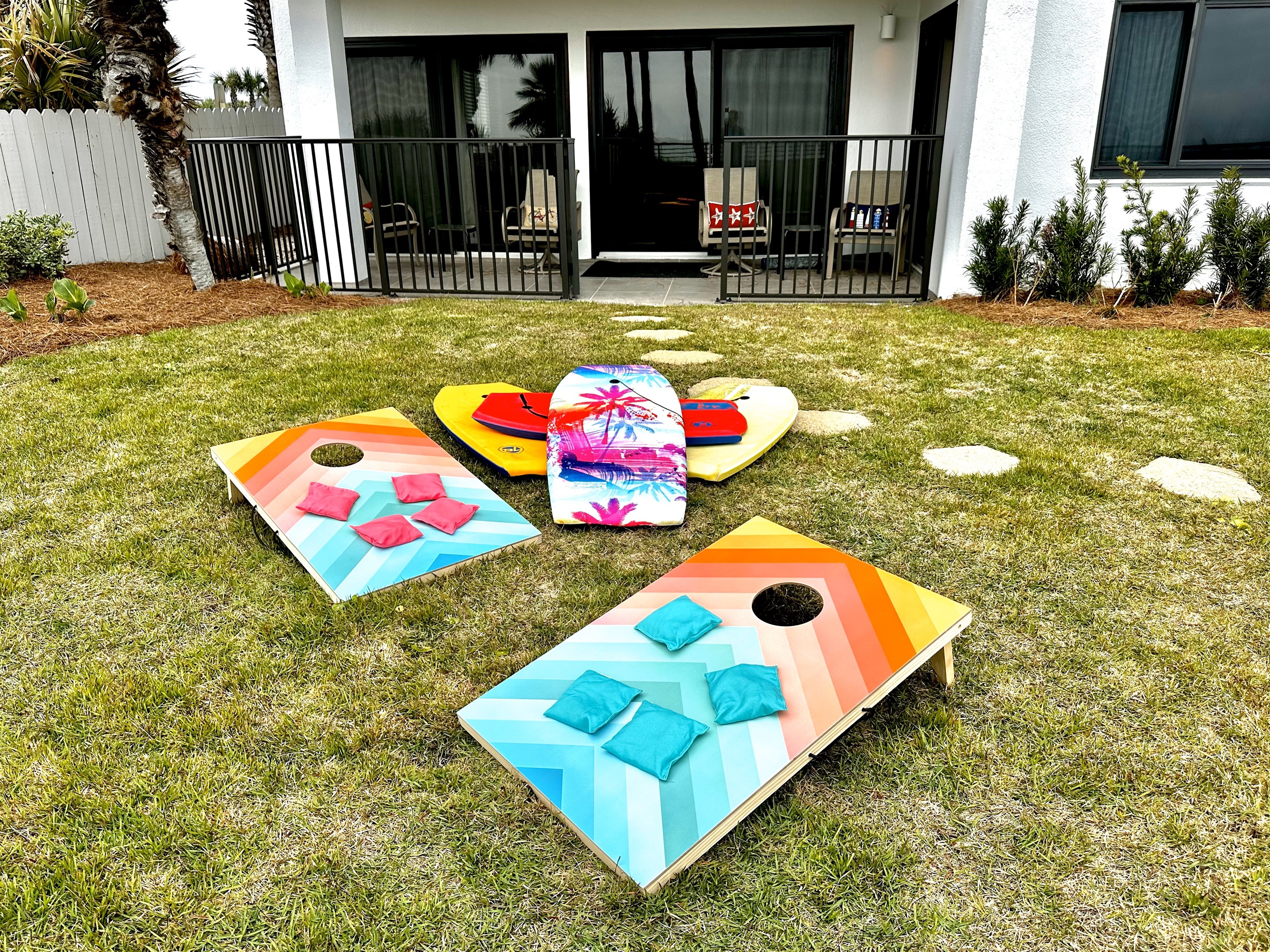 Play a game of corn hole in your backyard oasis or take the boogie boards down to the beach.