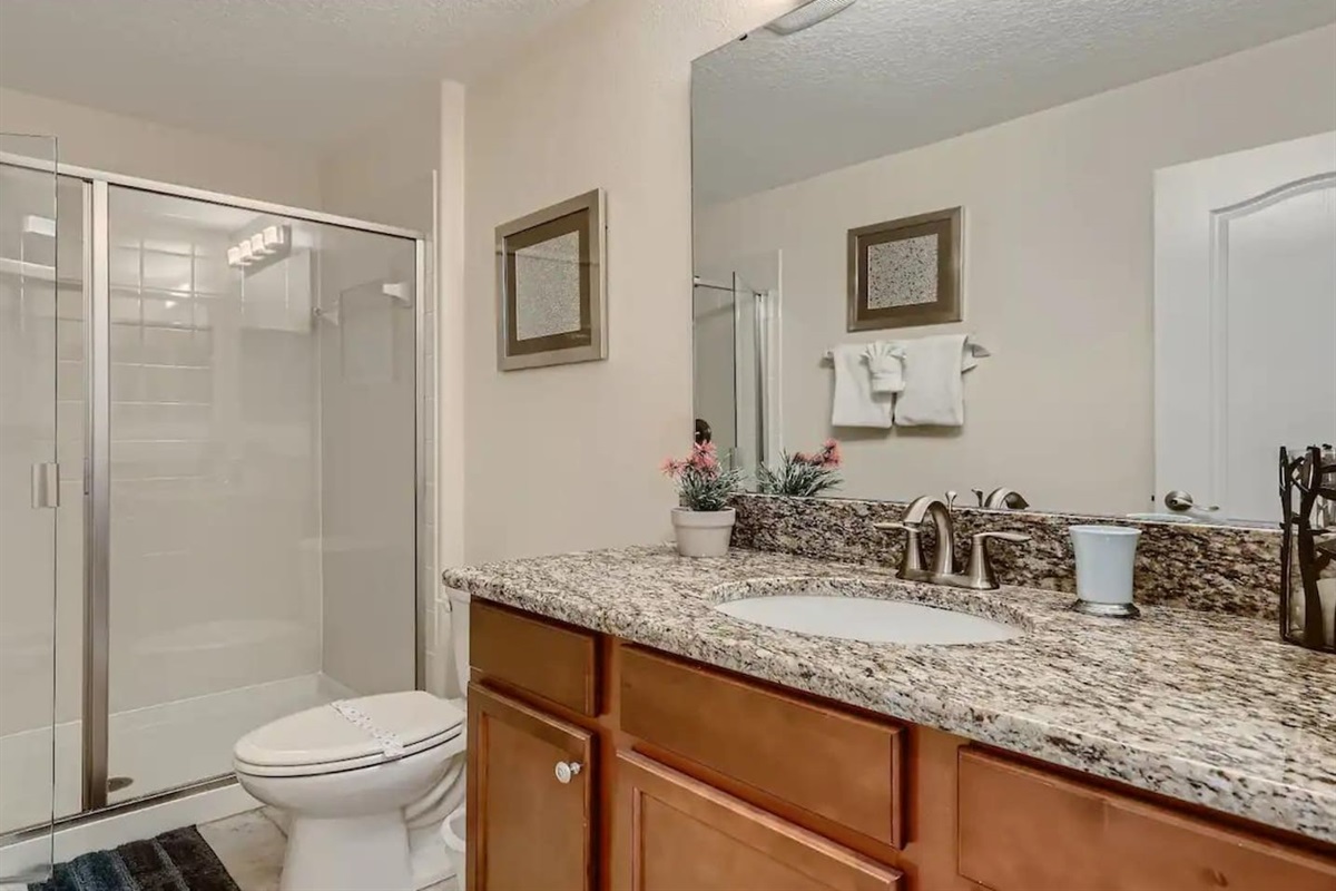 Bathroom in front of the 2 full beds room