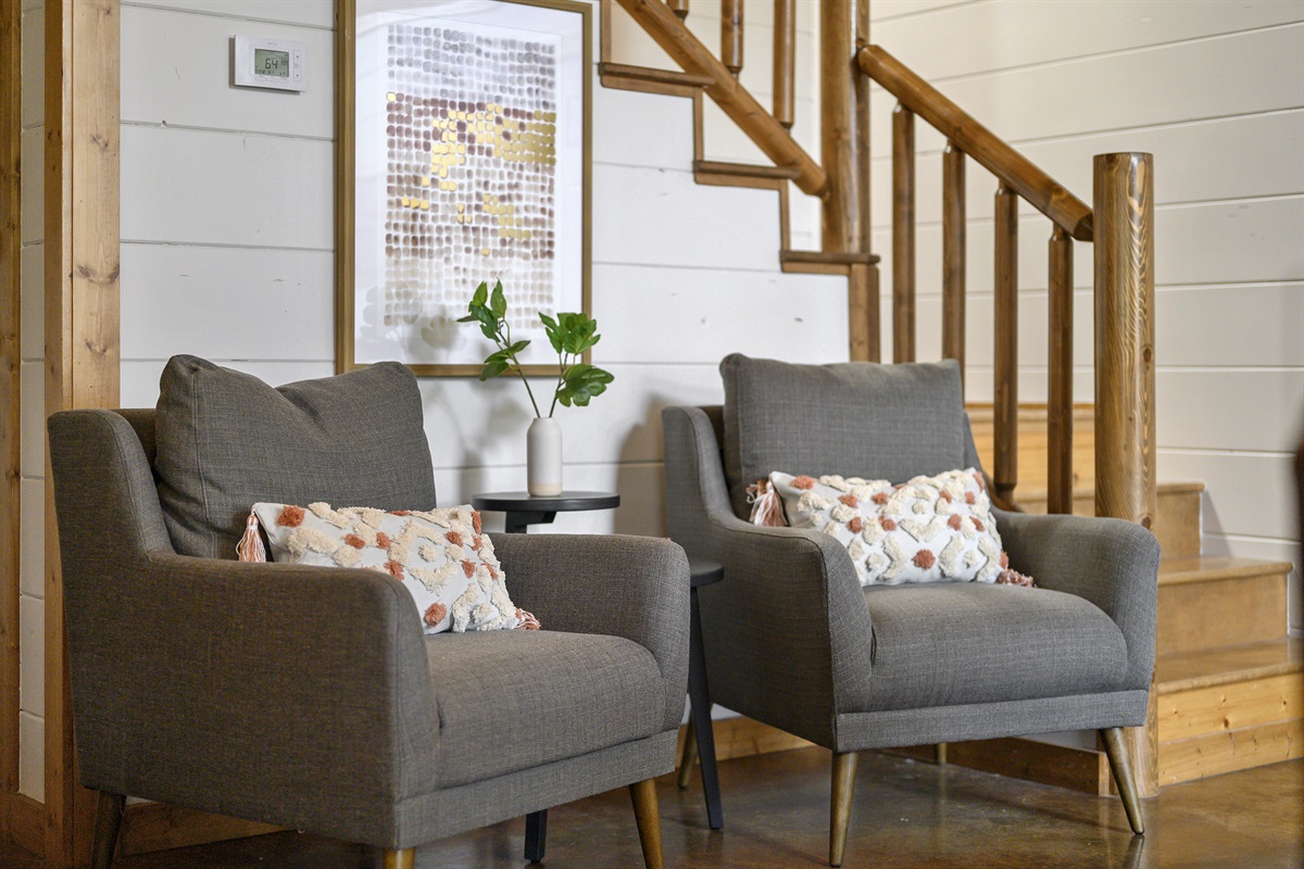 Cozy up by the stairs and unwind in comfort, where every corner of our home invites relaxation